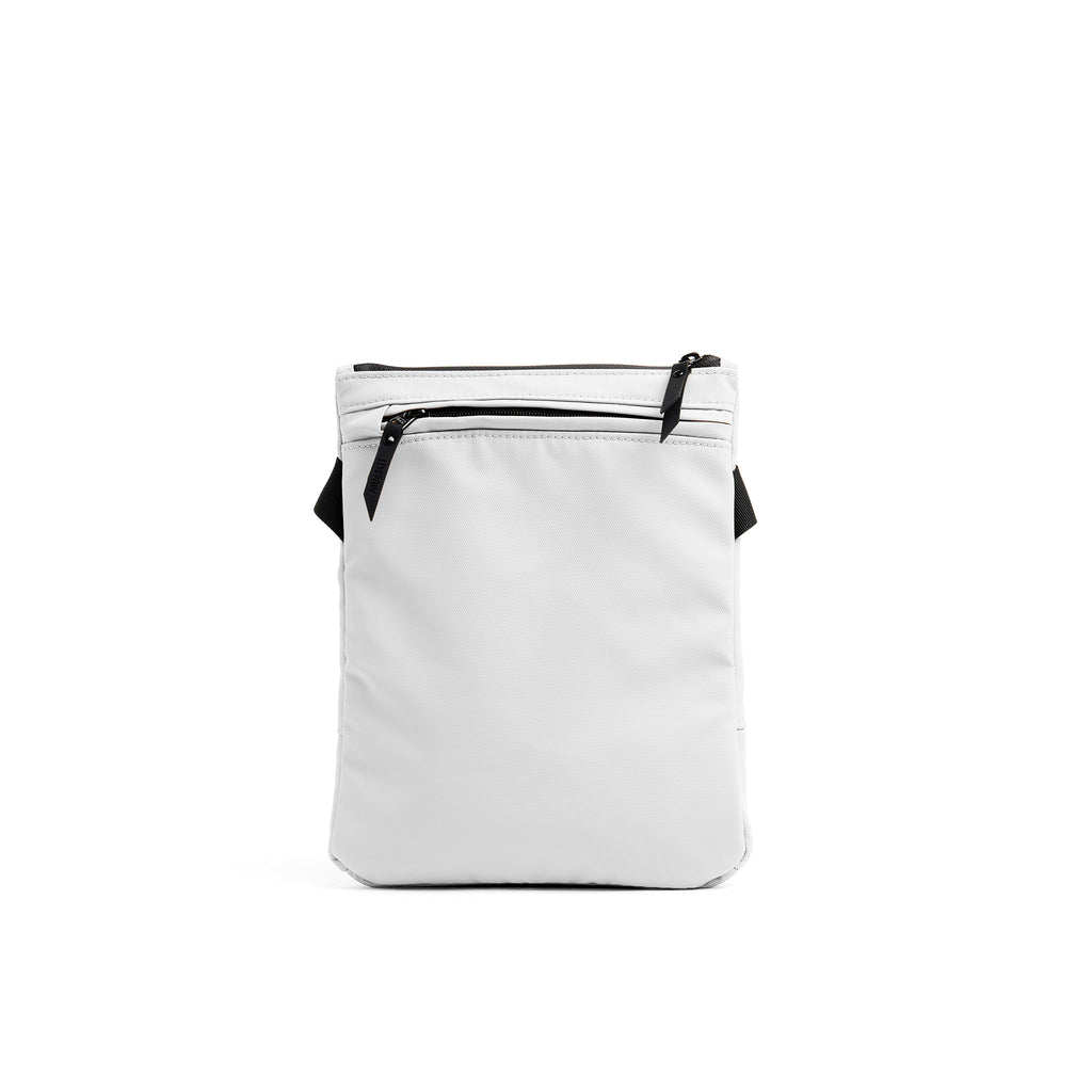 Mueslii crossbody, made of PU coated waterproof nylon, color pure white, back view.
