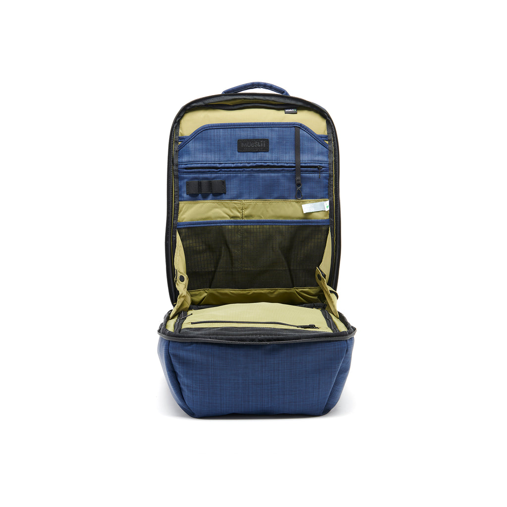 Mueslii travel backpack, made of water resistant canvas nylon, with a laptop compartment, color ocean blue, cabin luggage, inside view.