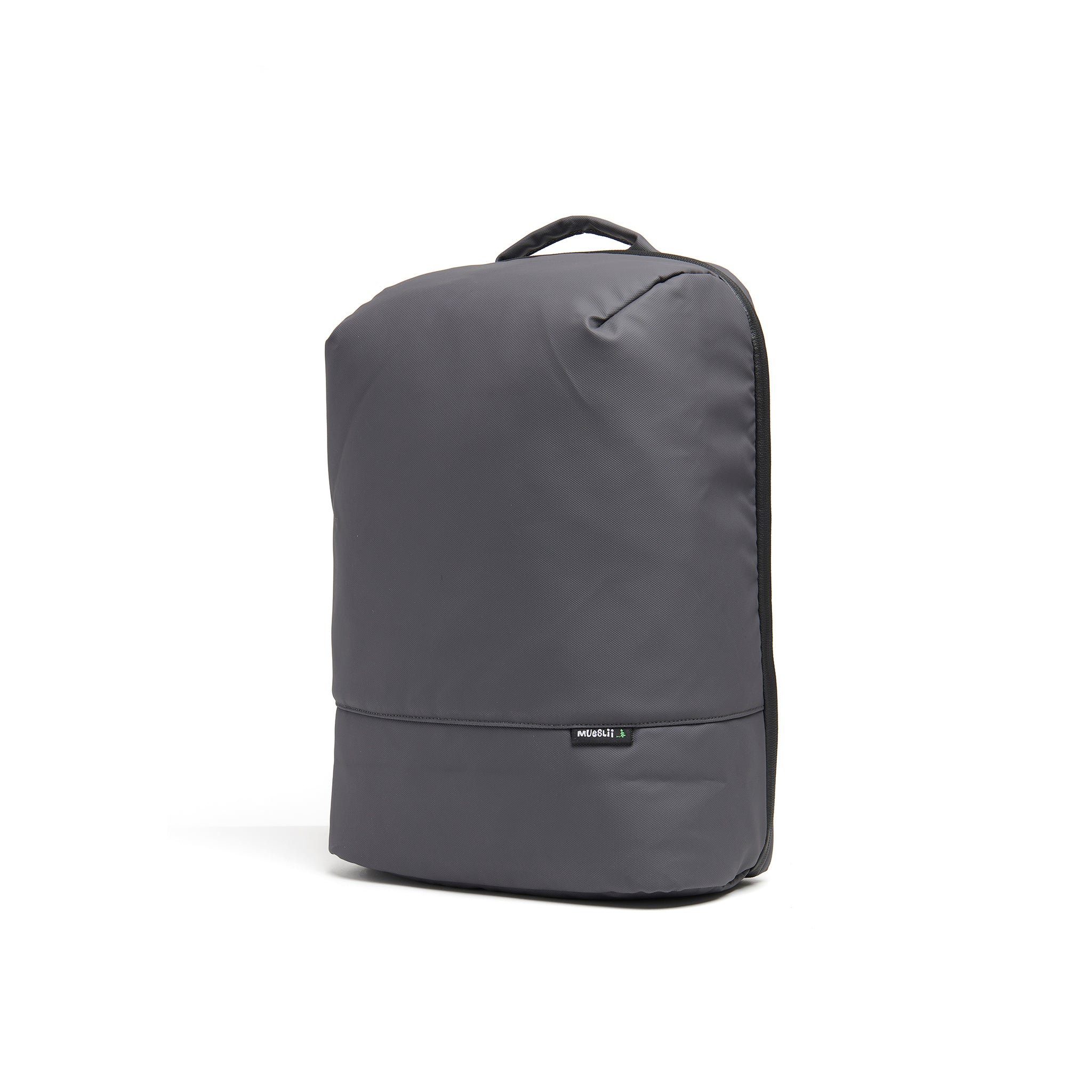 Mueslii travel backpack, made of PU coated waterproof nylon, with a laptop compartment, color grey, side view.