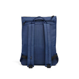Mueslii light backpack, made of water resistant canvas nylon, with a laptop compartment, color ocean blue, back view.