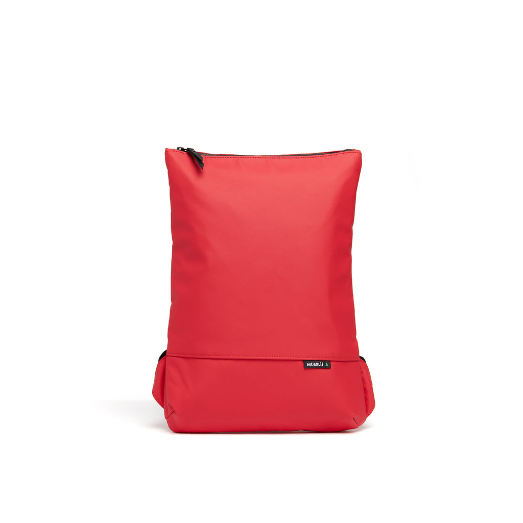 Mueslii light backpack,  made of PU coated waterproof nylon, with a laptop compartment, color coral red, front view.