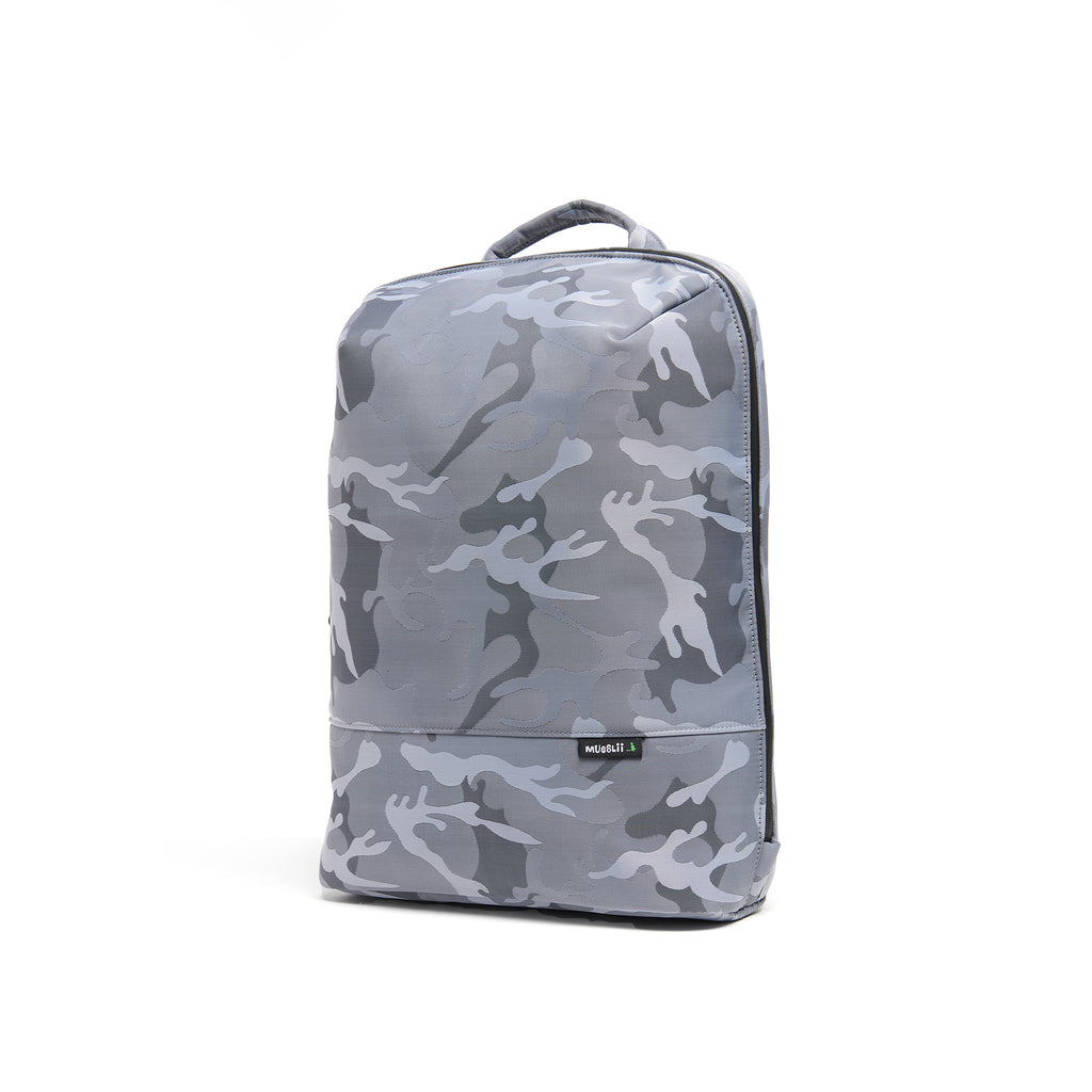 Mueslii daily backpack, made of jacquard  waterproof nylon, camouflage pattern, with a laptop compartment, color silver, side view.
