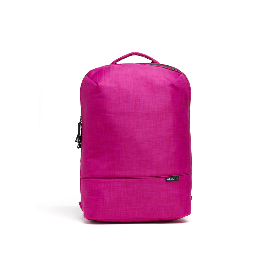 Mueslii daily backpack, made of  water resistant canvas nylon, with a laptop compartment, color fuchsia, front view.