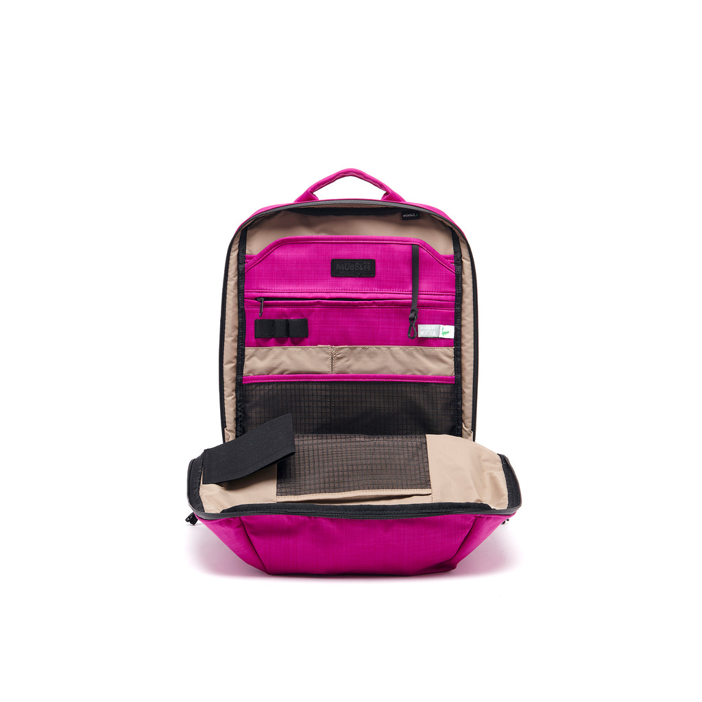 Mueslii daily backpack, made of  water resistant canvas nylon, with a laptop compartment, color fuchsia, inside view.