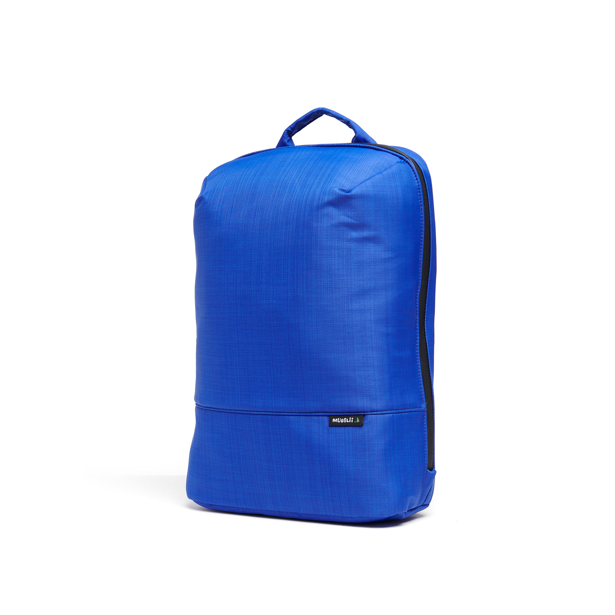 Mueslii daily backpack, made of  water resistant canvas nylon, with a laptop compartment, color summer blue, side view.