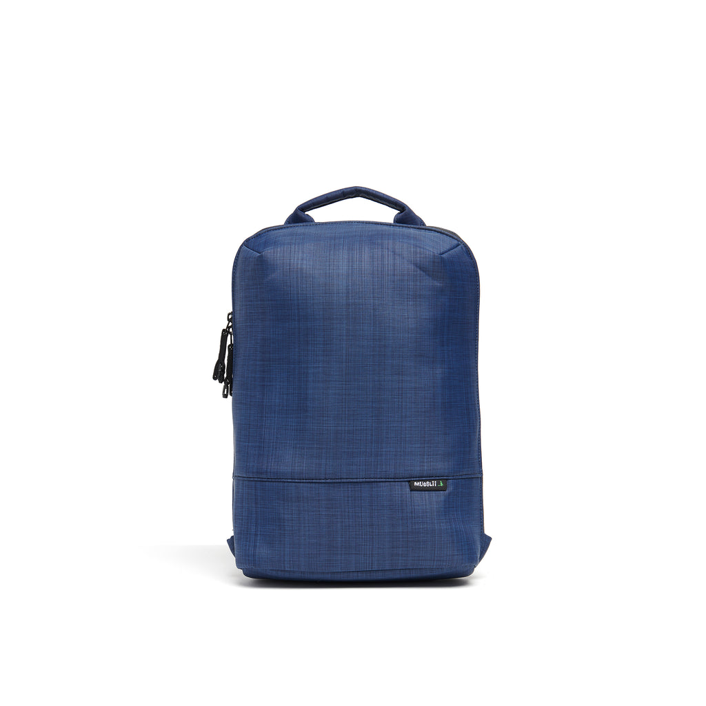 Mueslii small backpack,  made of  water resistant canvas nylon,  with a laptop compartment, color ocean blue, front view.