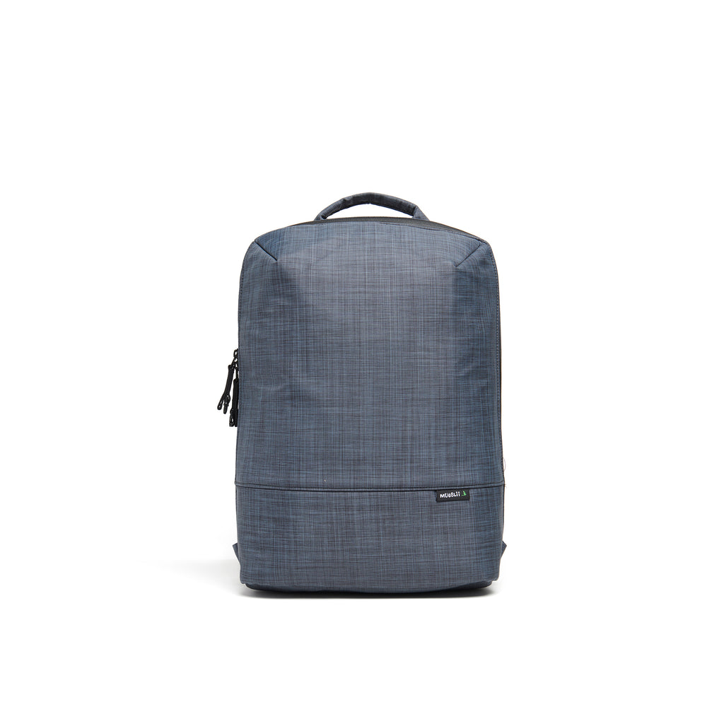 Mueslii small backpack,  made of  water resistant canvas nylon,  with a laptop compartment, color slate grey, front view.