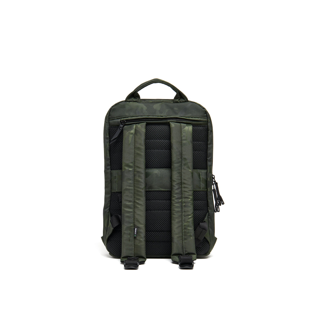 Mueslii small backpack, made of jacquard  waterproof nylon, camouflage pattern, with a laptop compartment, color green, back view.
