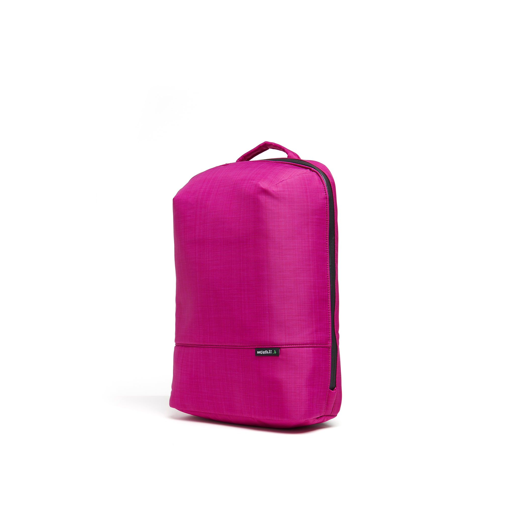Mueslii small backpack,  made of  water resistant canvas nylon,  with a laptop compartment, color fuchsia, side view.