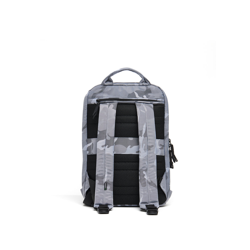 Mueslii small backpack, made of jacquard  waterproof nylon, camouflage pattern, with a laptop compartment, color silver, back view.
