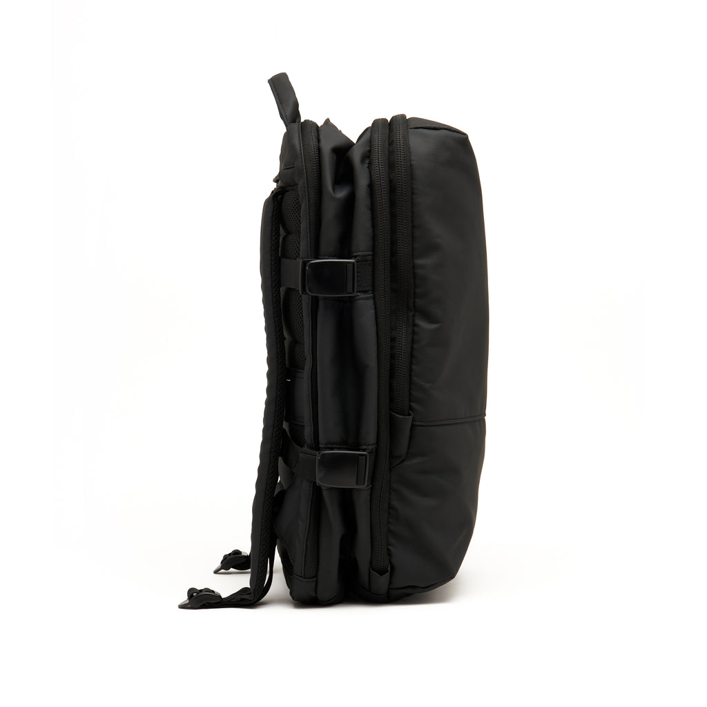 Mueslii travel backpack, made of PU coated waterproof nylon, color black, light and extensible.