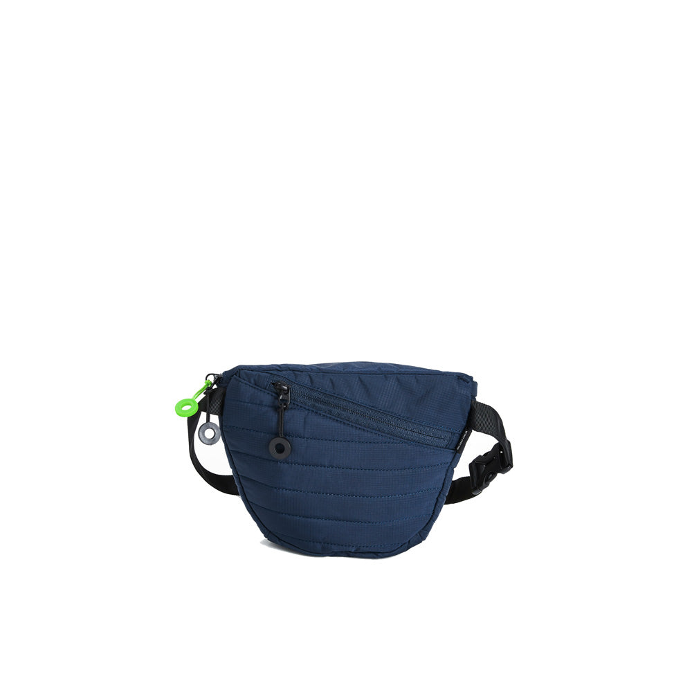 Mueslii puffer waist bag, made of high density nylon and Ykk zips, color high tech blue, back view.