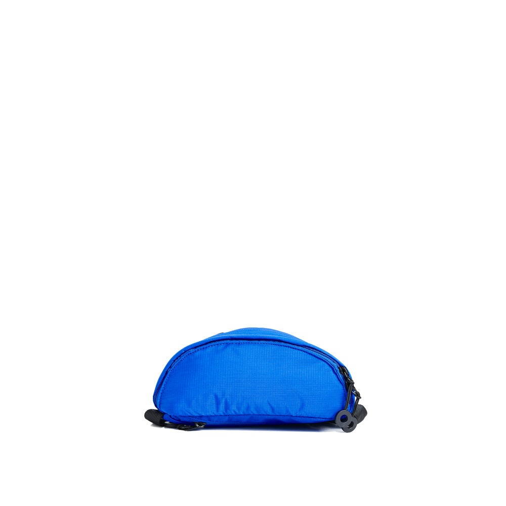 Mueslii puffer waist bag, made of high density nylon and Ykk zips, color high tech blue, medium size,.