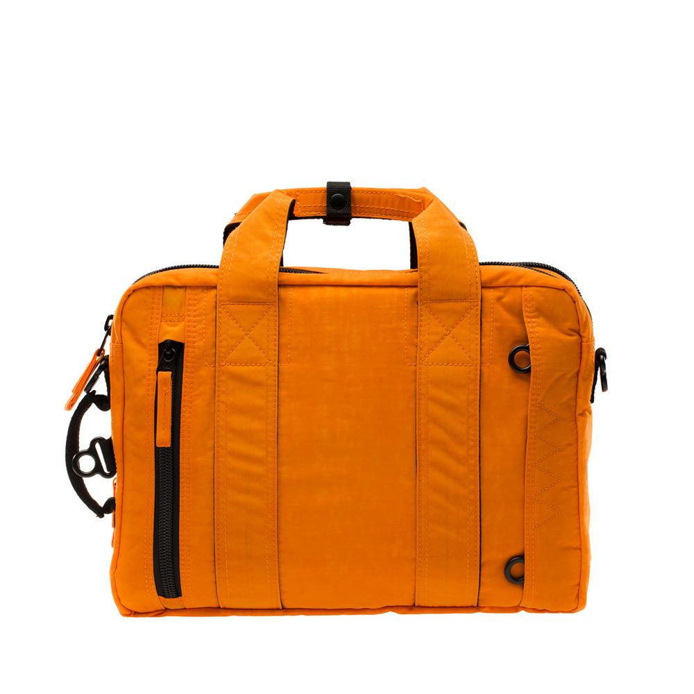 Mueslii classic 3 ways that can be used as backpack a shoulder bag or a briefcase, color orange peel, back side.
