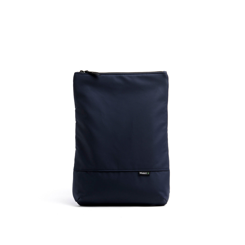Mueslii light backpack,  made of PU coated waterproof nylon, with a laptop compartment, color midnight blue, front view.