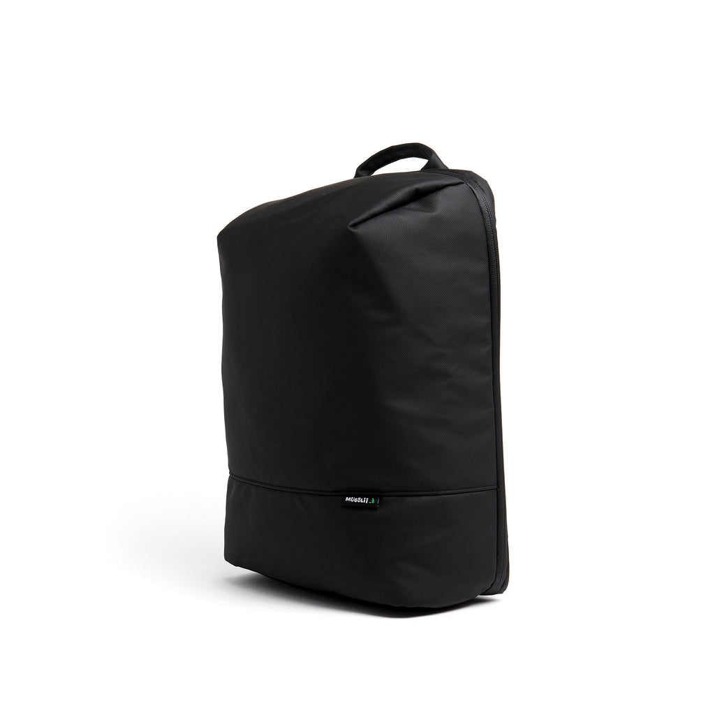 Mueslii travel backpack, made of PU coated waterproof nylon, with a laptop compartment, color coal black, side view.