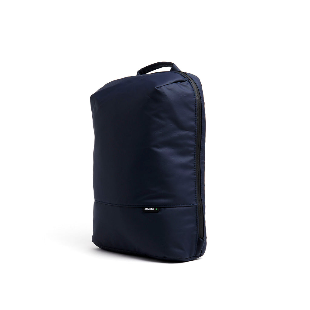 Mueslii daily backpack, made of PU coated waterproof nylon, with a laptop compartment, color blue, side view.