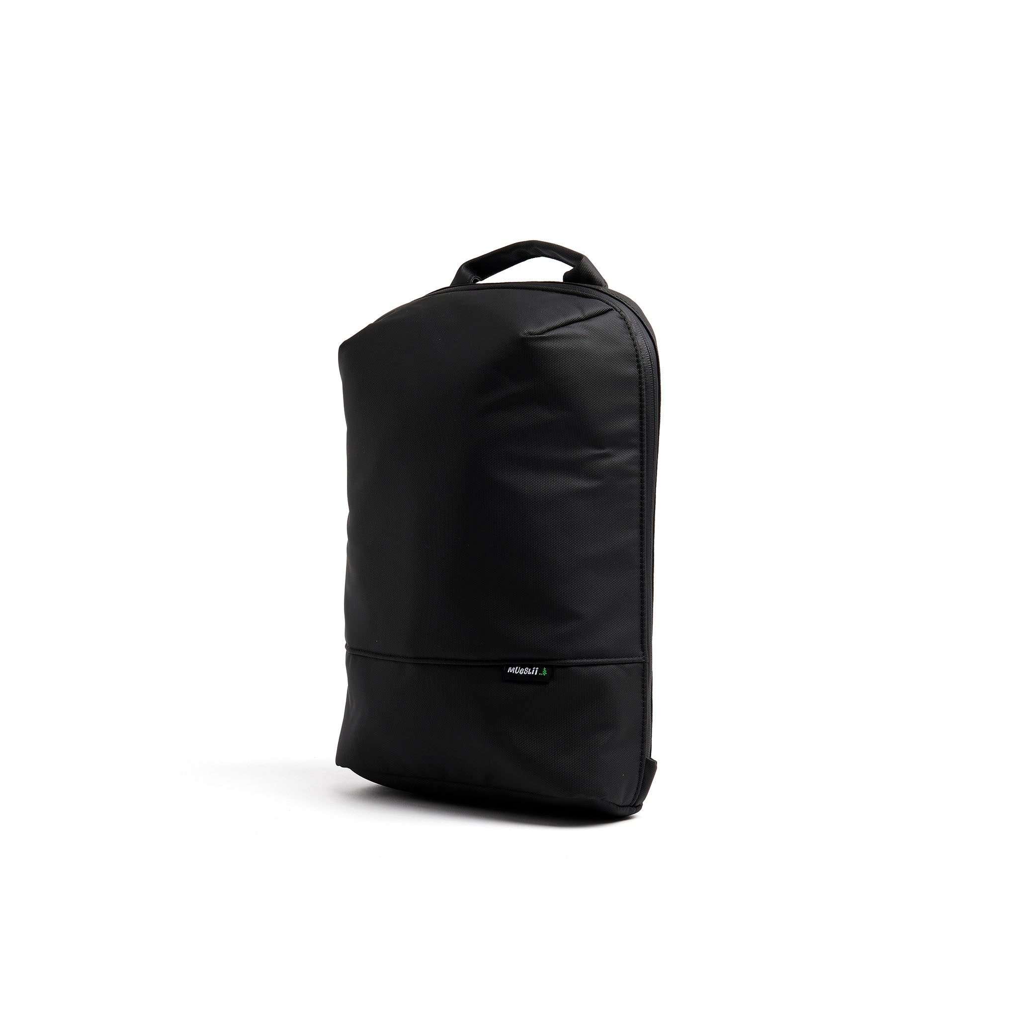 Mueslii small backpack, made of PU coated waterproof nylon, with a laptop compartment, color black, side view.