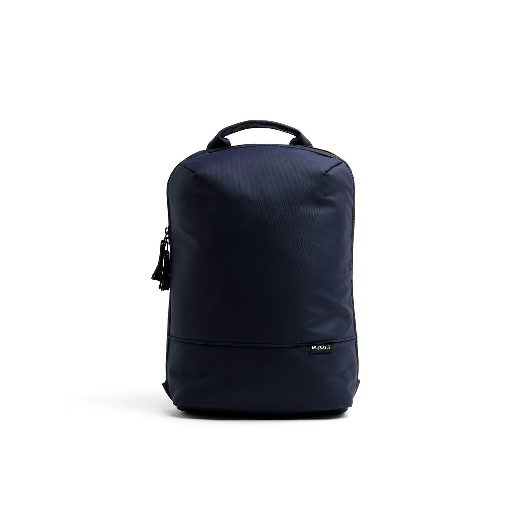 Mueslii small backpack, made of PU coated waterproof nylon, with a laptop compartment, color midnight blue, front view.