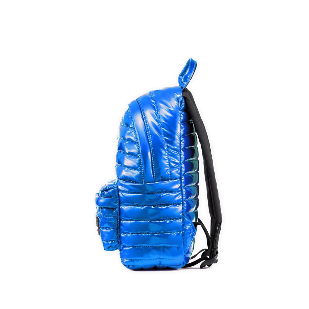 Mueslii original puffer medium and small backpack made of metal coated nylon and Ykk zips, color blue, side view.