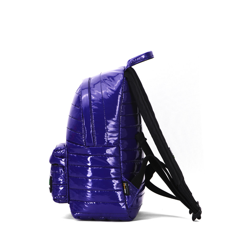 Mueslii original puffer medium and small backpack made of metal coated nylon and Ykk zips, color purple blue, side view.