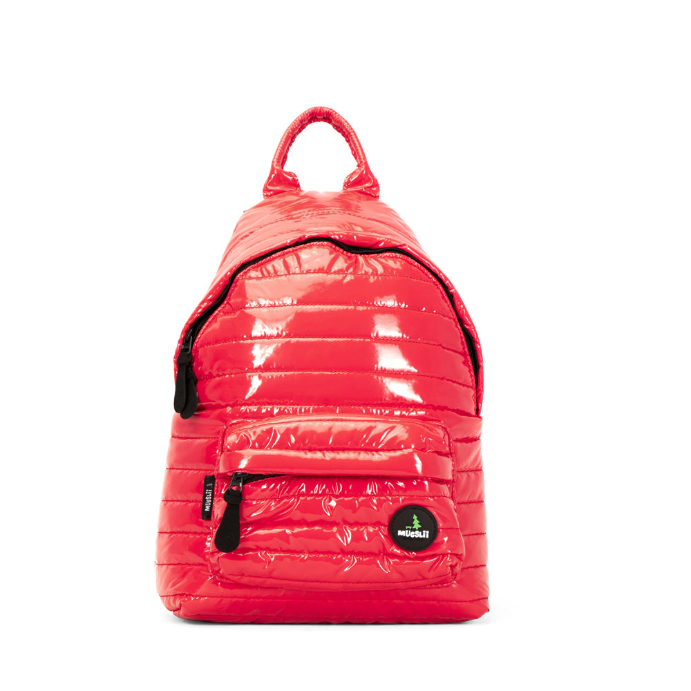 Mueslii original puffer medium and small backpack made of metal coated nylon and Ykk zips, color pink red, front view.