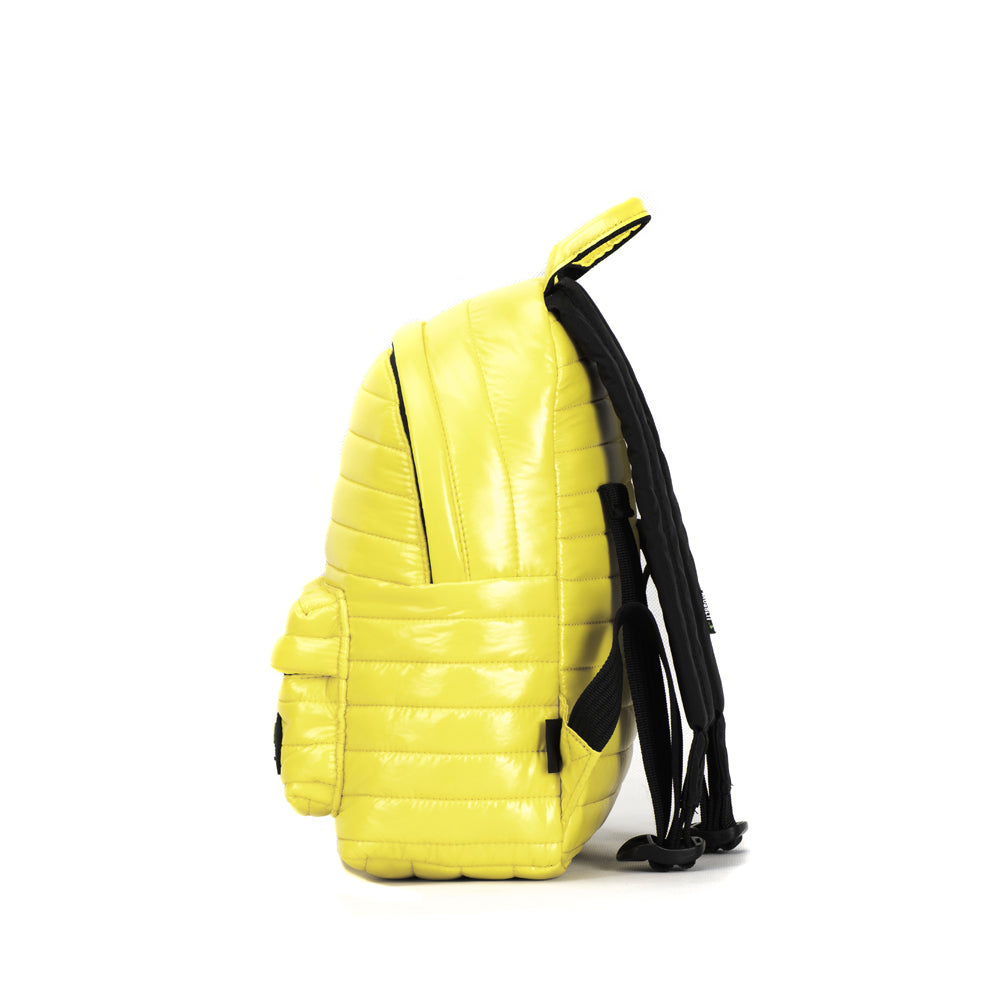 Mueslii original puffer medium and small backpack made of high density nylon and Ykk zips, color yellow, side view,