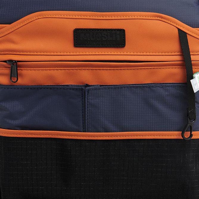 Mueslii daily backpack, made of PU coated waterproof nylon, with a laptop compartment, color orange, inside view.