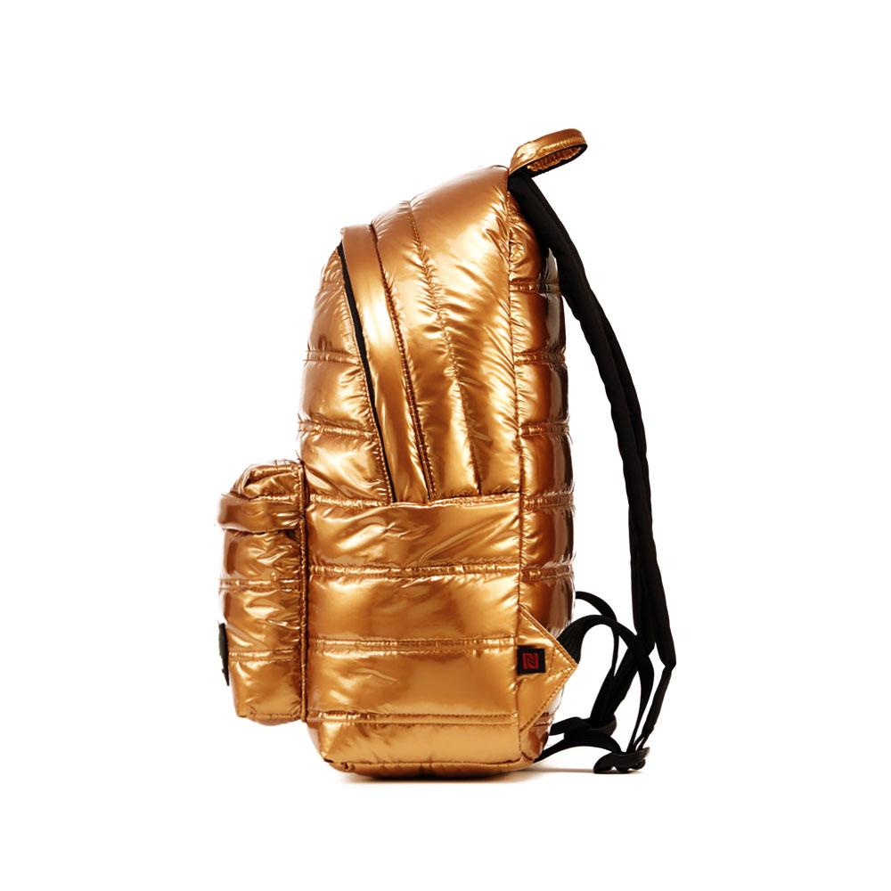 Mueslii original puffer daily backpack made of metal coated nylon and Ykk zips, color gold, side view.