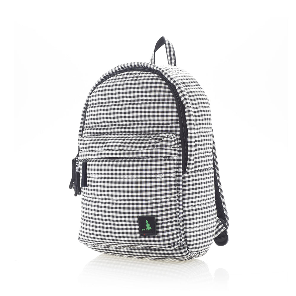 Mueslii original puffer daily backpack made of high density nylon and Ykk zips, color black and white, chequered, light and confortable.