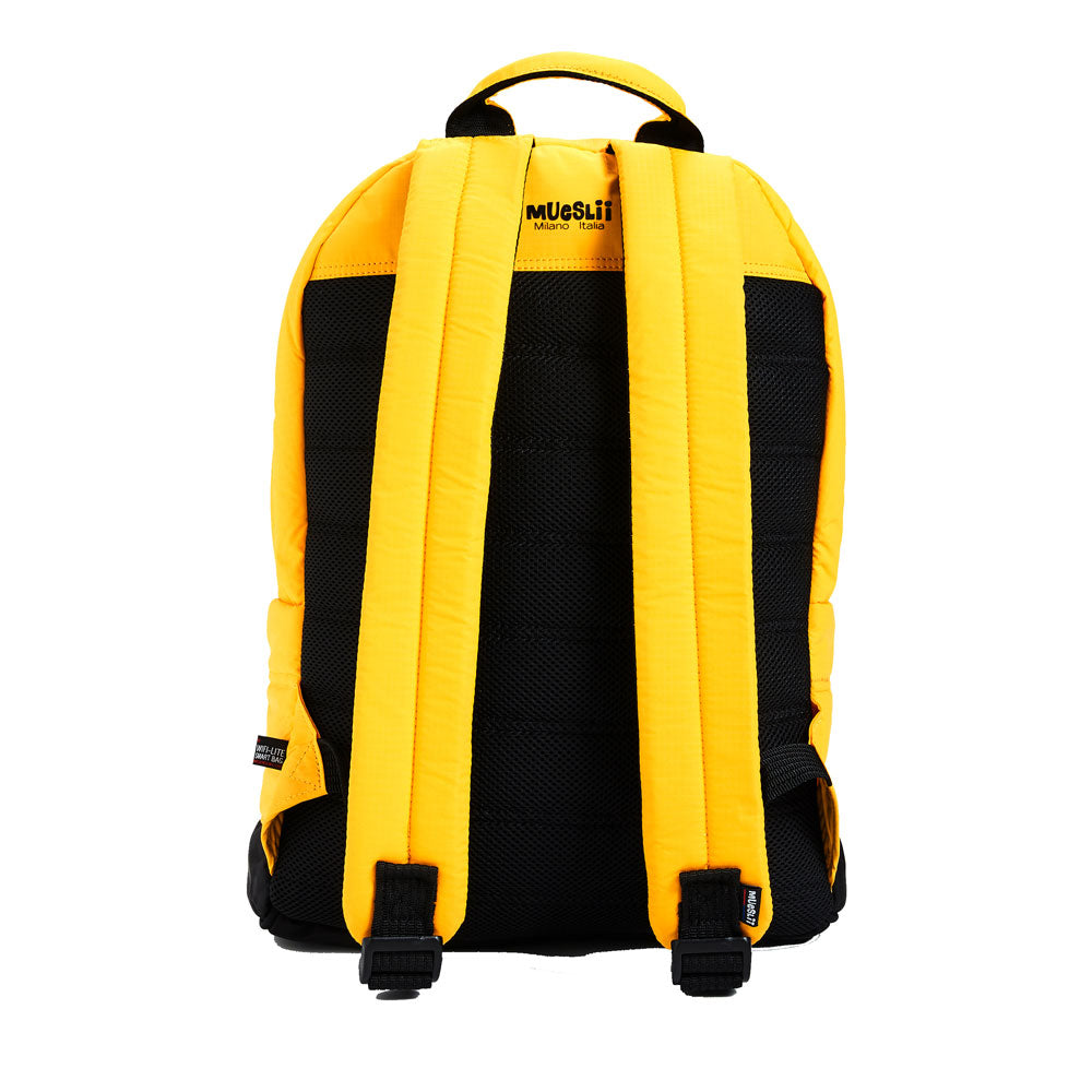 Mueslii original puffer laptop backpack made of high density nylon and Ykk zips, color matte yellow, back view.