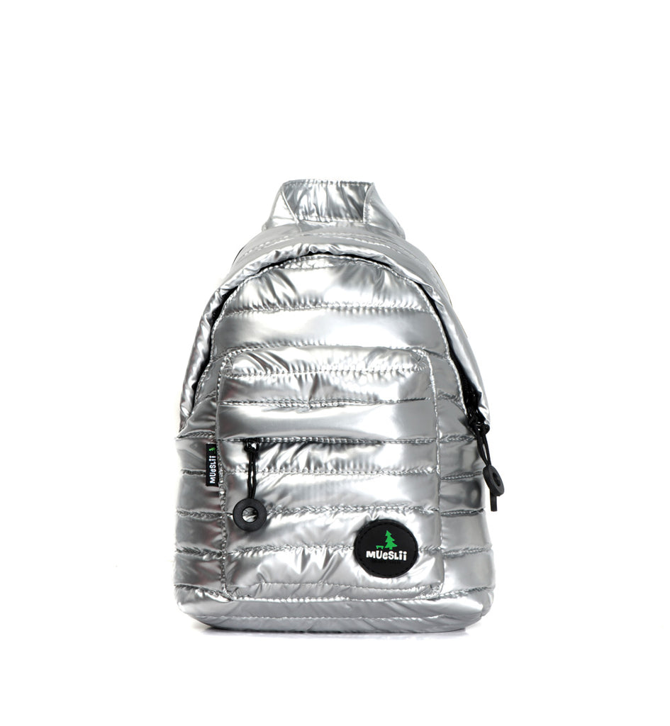 Mueslii original puffer extra small pack made of high density nylon and Ykk zips, color silver, front view.