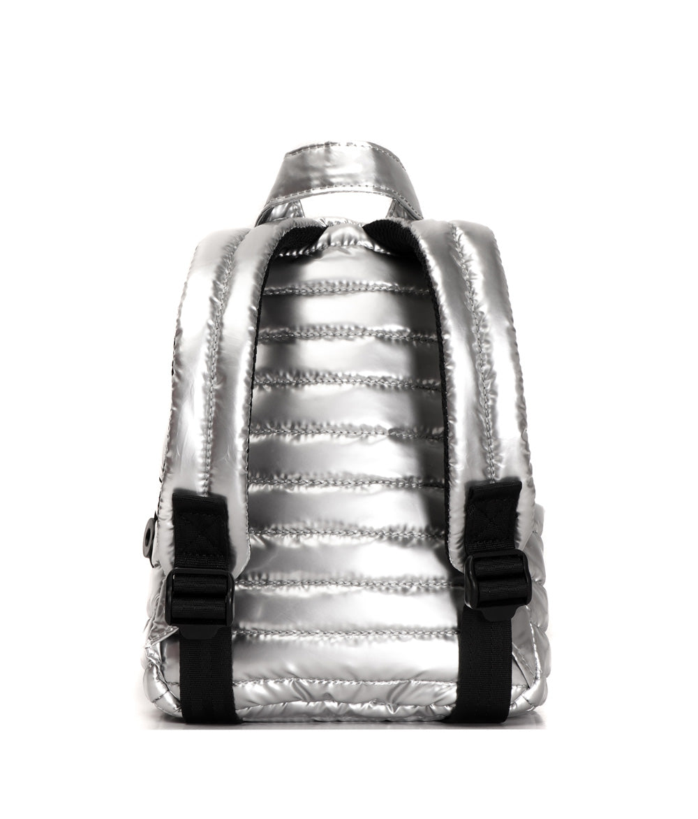 Mueslii original puffer extra small pack made of high density nylon and Ykk zips, color silver, back view.