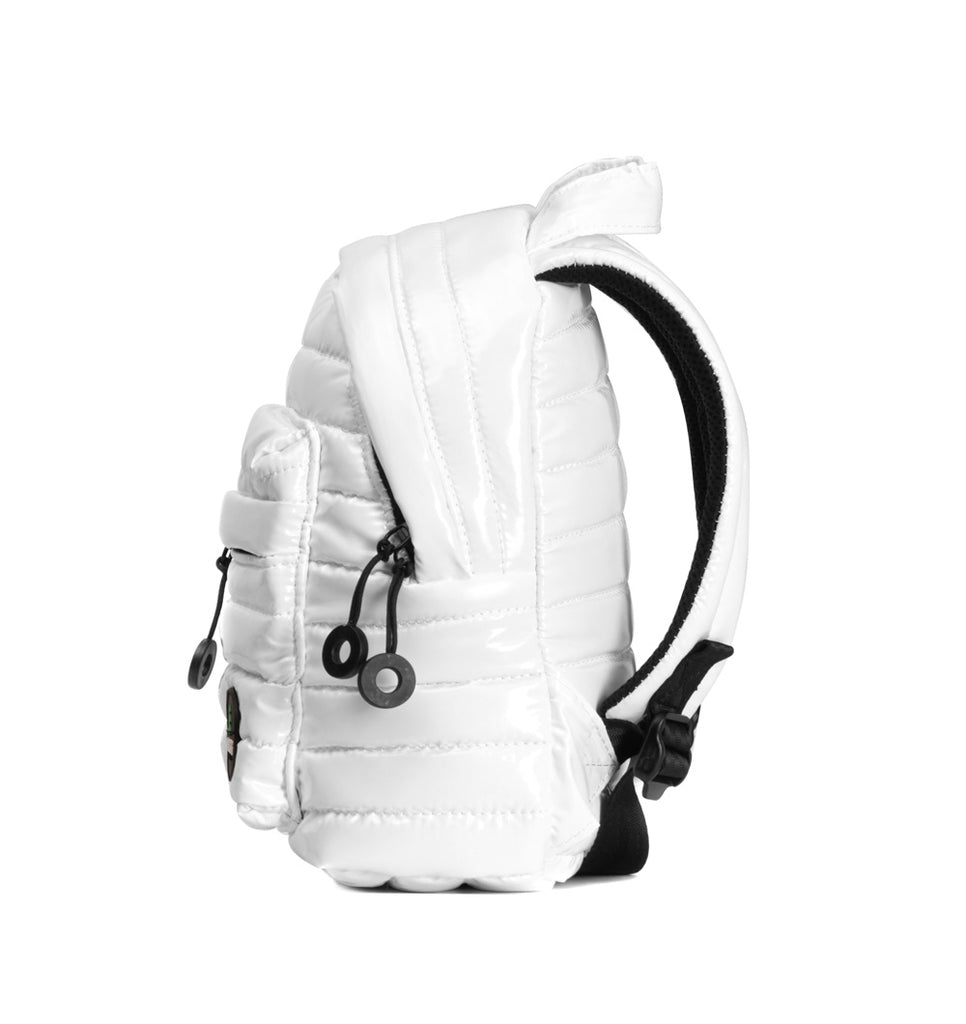 Mueslii original puffer extra small pack made of high density nylon and Ykk zips, color white, side view.
