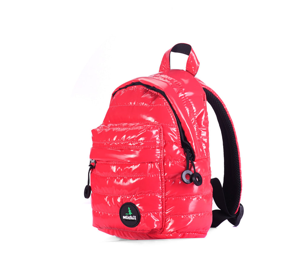 Mueslii original puffer extra small pack made of high density nylon and Ykk zips, color  pink red. Material: waterproof “metal” coated nylon. 