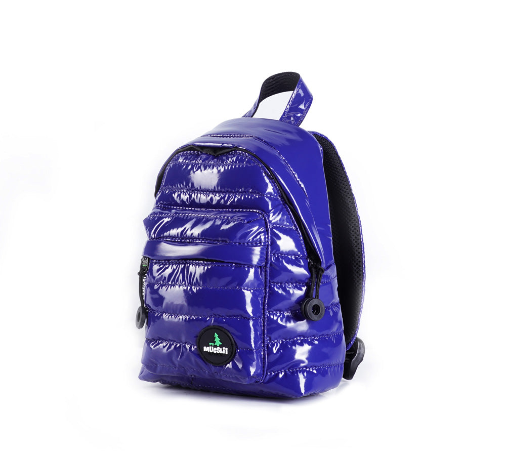 Mueslii original puffer extra small pack made of high density nylon and Ykk zips, color blue, zippered front pocket.