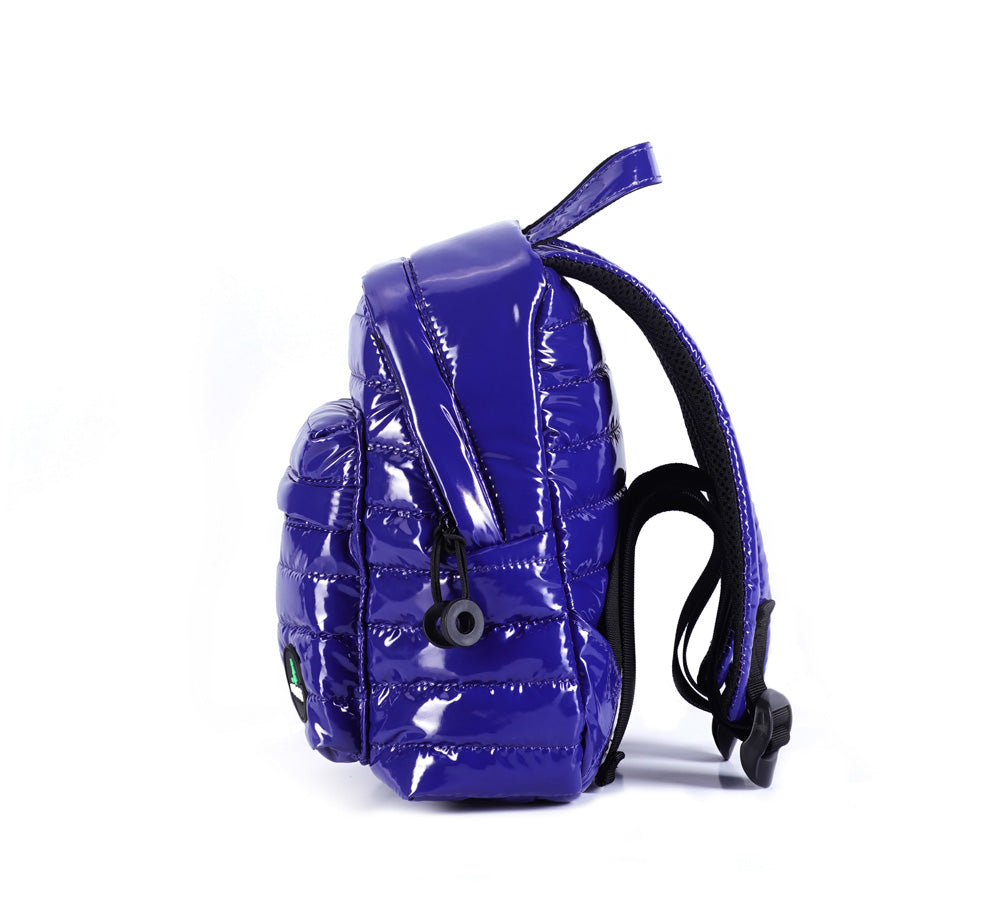 Mueslii original puffer extra small pack made of high density nylon and Ykk zips, color blue, side view.