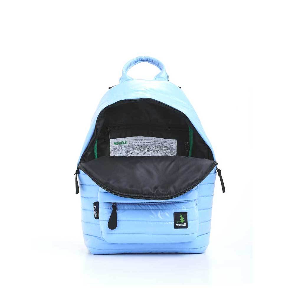 Mueslii original puffer medium and small backpack made of high density nylon and Ykk zips, color light blue, inside view.