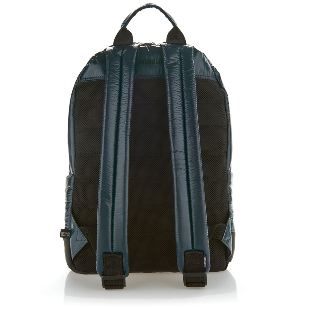 Mueslii original puffer laptop backpack made of high density nylon and Ykk zips, color blue shiny, back view.