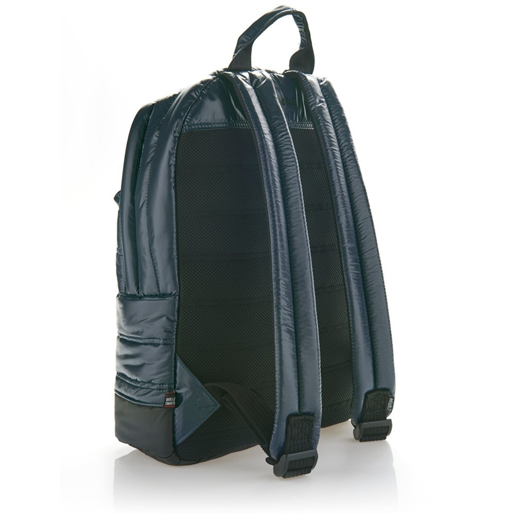 Mueslii original puffer laptop backpack made of high density nylon and Ykk zips, color blue shiny, back view.