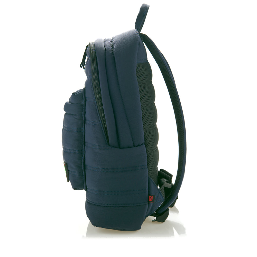 Mueslii original puffer laptop backpack made of high density nylon and Ykk zips, color matte blue, side view.